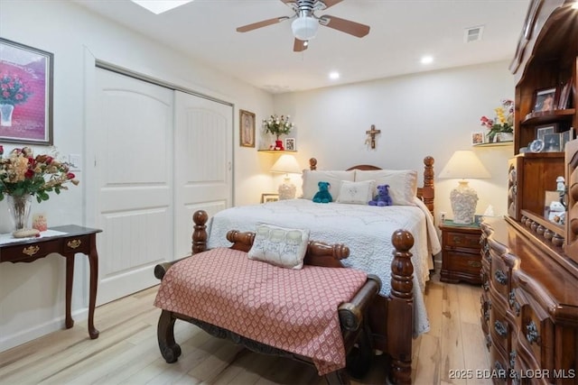 169 Kaanapali Dr, Roach, MO 65787 - bedroom with light wood-style flooring, a closet, recessed lighting, and ceiling fan