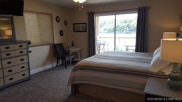 1481 Ledges Dr Unit 221, Osage Beach, MO 65065 - bedroom with carpet floors, access to exterior, and baseboards