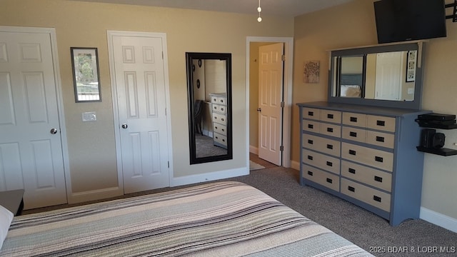 1481 Ledges Dr Unit 221, Osage Beach, MO 65065 - carpeted bedroom featuring baseboards