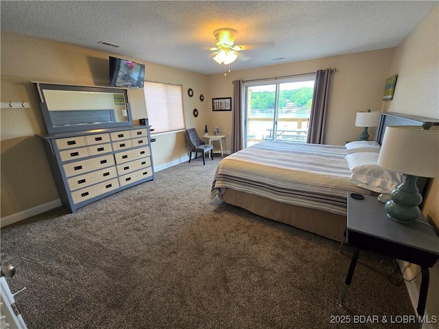 1481 Ledges Dr Unit 221, Osage Beach, MO 65065 - bedroom with a textured ceiling, carpet, and baseboards