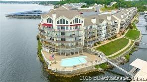 1481 Ledges Dr Unit 221, Osage Beach, MO 65065 - aerial view of a large body of water and a pool