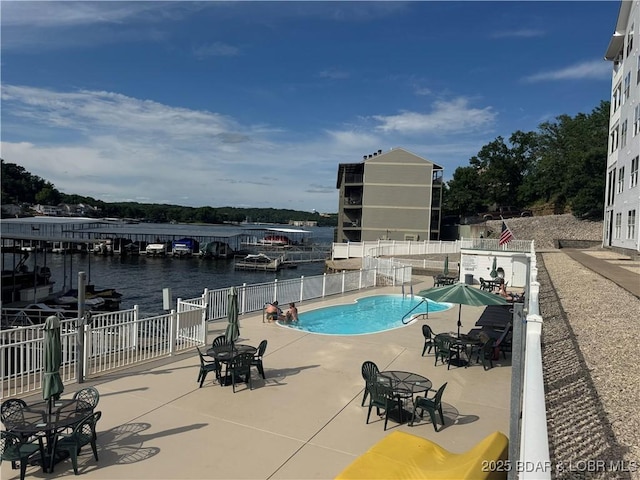 275 Flynn Rd Unit 207, Lake Ozark, MO 65049 - community pool with a patio area and a water view