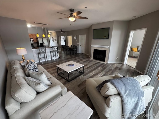 275 Flynn Rd Unit 207, Lake Ozark, MO 65049 - living area with ceiling fan, dark wood finished floors, and a tile fireplace