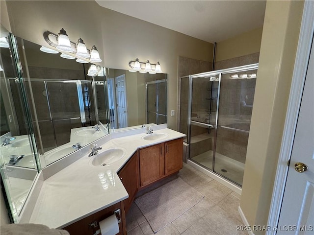 275 Flynn Rd Unit 207, Lake Ozark, MO 65049 - full bath with tile patterned flooring, a stall shower, and double vanity