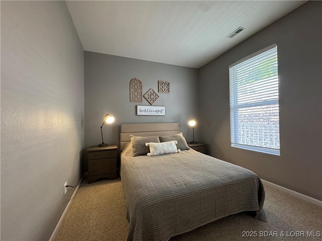 275 Flynn Rd Unit 207, Lake Ozark, MO 65049 - carpeted bedroom featuring multiple windows