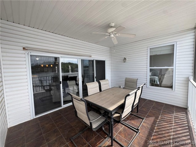 275 Flynn Rd Unit 207, Lake Ozark, MO 65049 - sunroom with ceiling fan and outdoor dining space