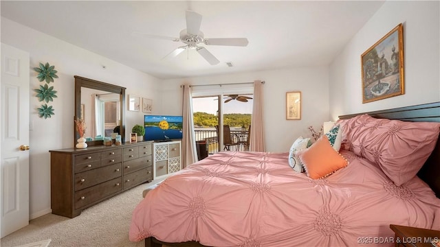 364 Cedar Heights Dr Unit 2D, Camdenton, MO 65020 - bedroom featuring access to exterior, light colored carpet, and ceiling fan