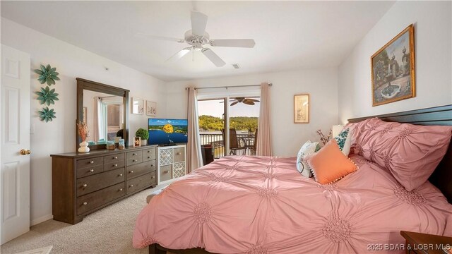 364 Cedar Heights Dr Unit 2D, Camdenton, MO 65020 - bedroom featuring access to outside, light colored carpet, and a ceiling fan