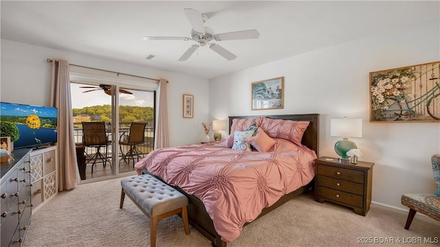364 Cedar Heights Dr Unit 2D, Camdenton, MO 65020 - bedroom featuring light carpet, access to outside, baseboards, and a ceiling fan