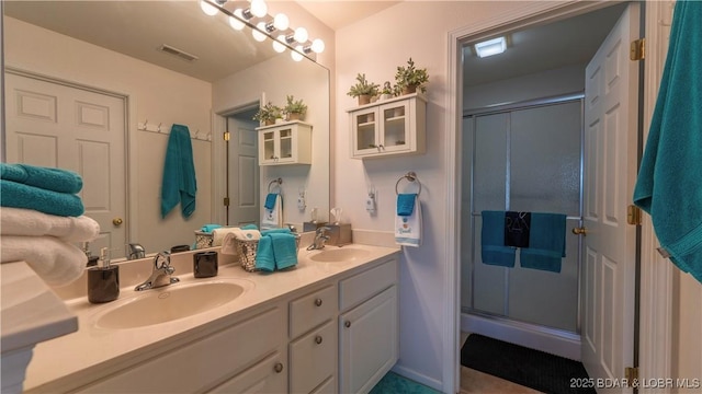 364 Cedar Heights Dr Unit 2D, Camdenton, MO 65020 - full bathroom featuring double vanity and a shower stall