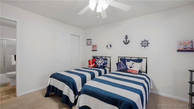364 Cedar Heights Dr Unit 2D, Camdenton, MO 65020 - carpeted bedroom featuring a closet, ceiling fan, and connected bathroom