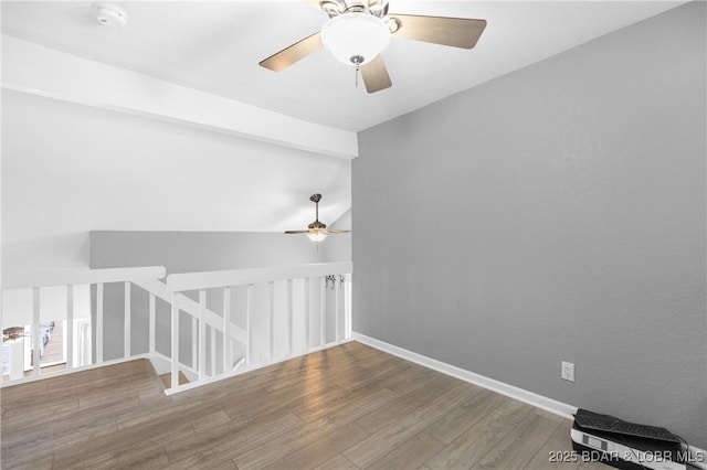 25 Redwood Ct, Sunrise Beach, MO 65079 - unfurnished room featuring ceiling fan, wood finished floors, baseboards, and a smoke detector