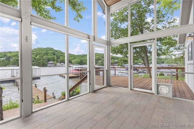25 Redwood Ct, Sunrise Beach, MO 65079 - unfurnished sunroom featuring a water view