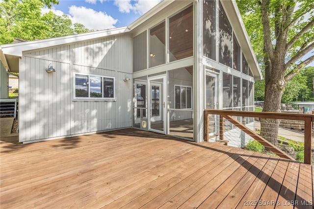 25 Redwood Ct, Sunrise Beach, MO 65079 - deck with a sunroom