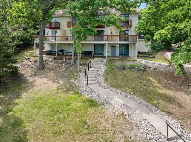 1318 Evergreen Ln Unit 4, Osage Beach, MO 65065 - rear view of property featuring a patio area