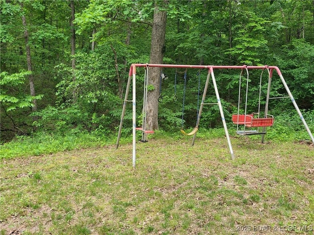 31025 Broken Circle Rd, Stover, MO 65078 - view of playground with a forest view