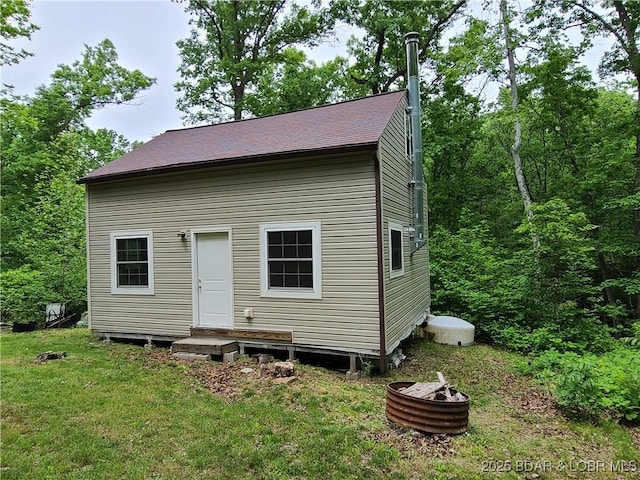 31025 Broken Circle Rd, Stover, MO 65078 - view of outdoor structure featuring a fire pit
