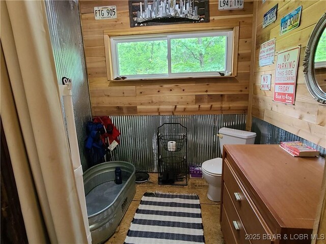 31025 Broken Circle Rd, Stover, MO 65078 - bathroom with wood walls, toilet, and vanity