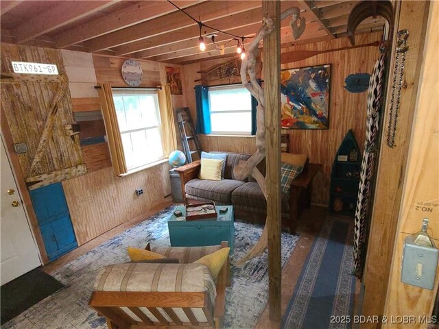31025 Broken Circle Rd, Stover, MO 65078 - living room with wood walls and beamed ceiling