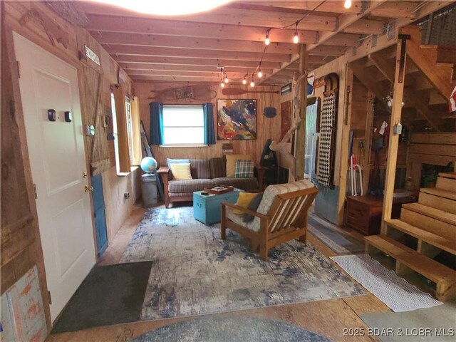 31025 Broken Circle Rd, Stover, MO 65078 - sitting room with stairs and wood walls