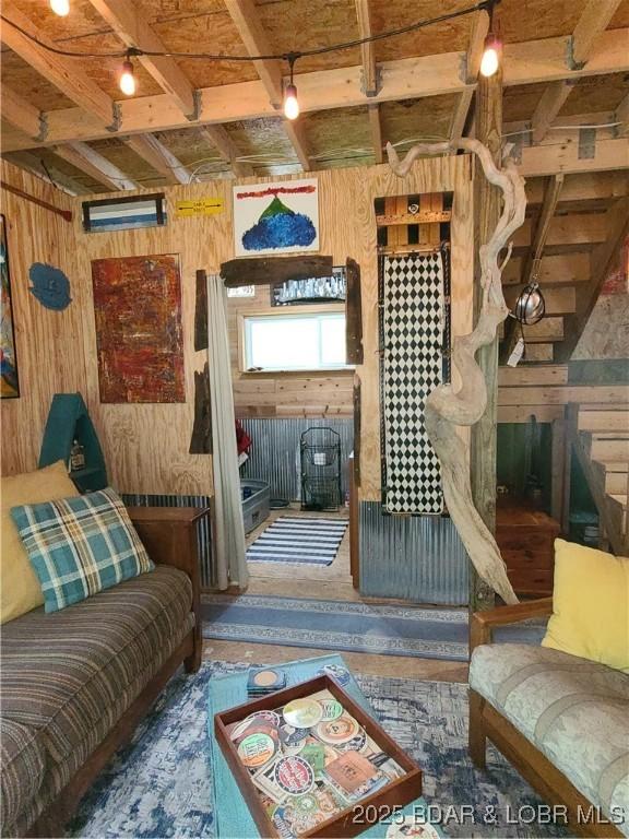 31025 Broken Circle Rd, Stover, MO 65078 - living room featuring wooden walls and beamed ceiling