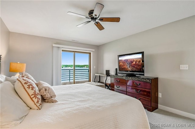 701 Cedar Rd Unit 1A, Lake Ozark, MO 65049 - bedroom with access to outside, baseboards, carpet floors, and a ceiling fan