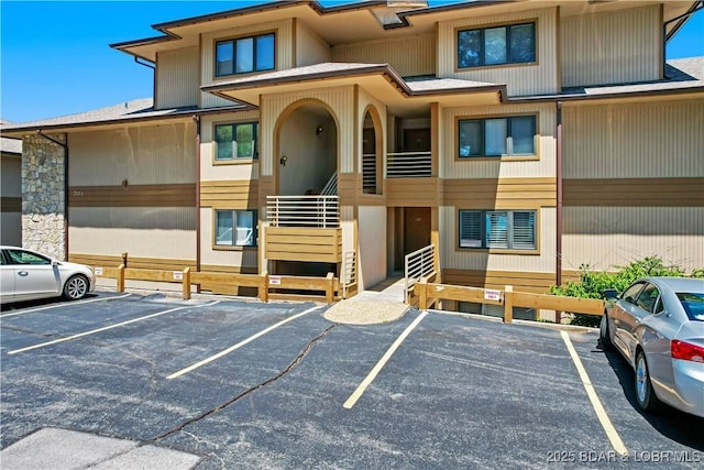 701 Cedar Rd Unit 1A, Lake Ozark, MO 65049 - view of building exterior featuring uncovered parking
