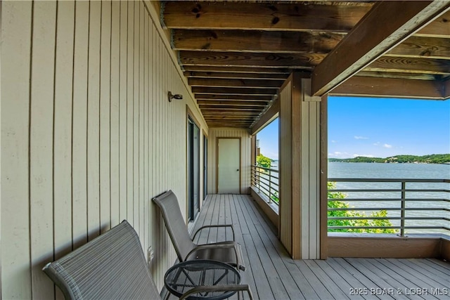 701 Cedar Rd Unit 1A, Lake Ozark, MO 65049 - wooden deck featuring a water view