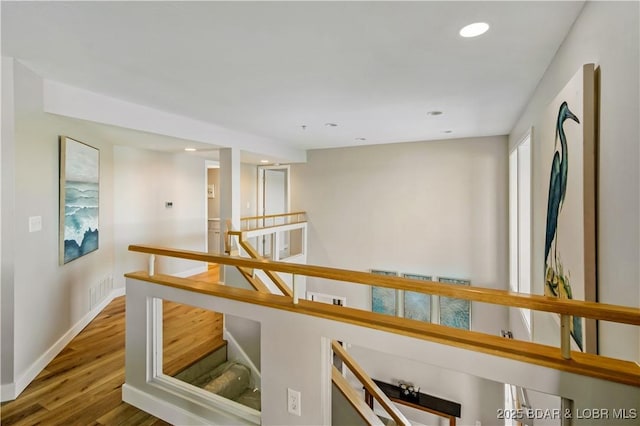 701 Cedar Rd Unit 1A, Lake Ozark, MO 65049 - stairs featuring wood finished floors, baseboards, and recessed lighting