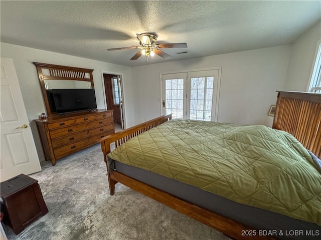 18400 Alum Springs Rd, Versailles, MO 65084 - bedroom featuring multiple windows, access to outside, a textured ceiling, and ceiling fan