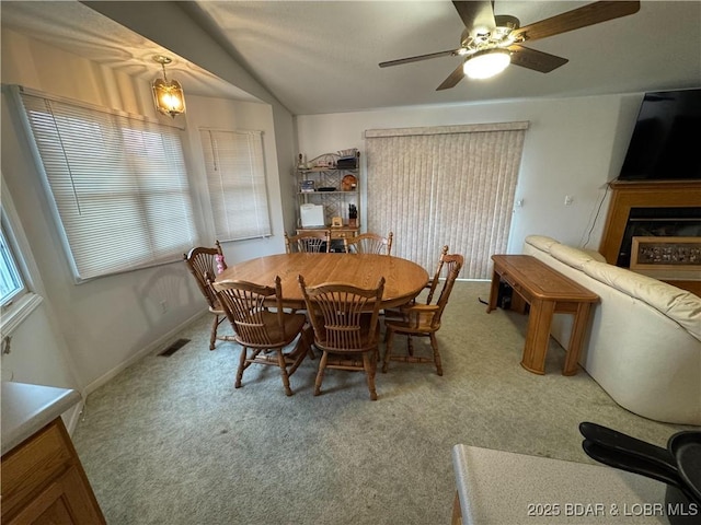 18400 Alum Springs Rd, Versailles, MO 65084 - dining room with a ceiling fan and carpet flooring