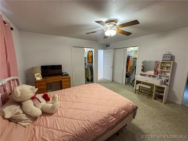 18400 Alum Springs Rd, Versailles, MO 65084 - carpeted bedroom with a textured ceiling and a ceiling fan