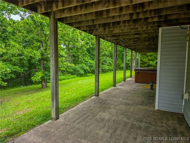 18400 Alum Springs Rd, Versailles, MO 65084 - view of patio / terrace featuring a hot tub