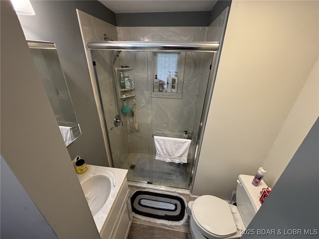 406 Staley Hollow Dr, Sunrise Beach, MO 65079 - full bathroom featuring toilet, a marble finish shower, and vanity