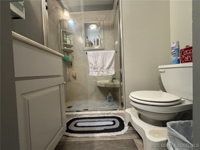 406 Staley Hollow Dr, Sunrise Beach, MO 65079 - full bathroom featuring a stall shower and toilet