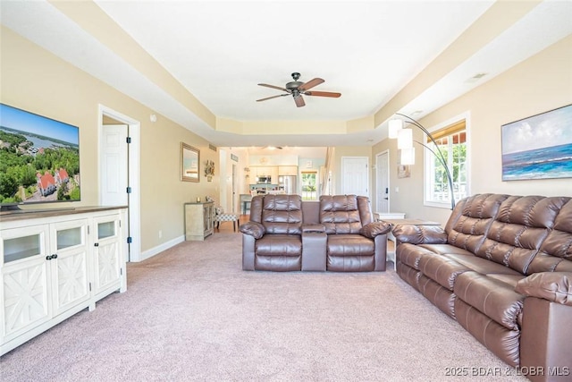 4066 Horseshoe Bend Pkwy Unit 3A, Lake Ozark, MO 65049 - living area with light carpet, ceiling fan, and baseboards