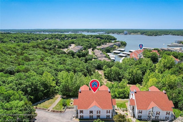 4066 Horseshoe Bend Pkwy Unit 3A, Lake Ozark, MO 65049 - drone / aerial view of a forest and a nearby body of water