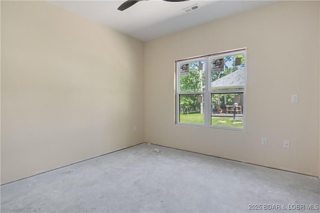535 Grand Point Blvd, Sunrise Beach, MO 65079 - empty room featuring unfinished concrete floors and a ceiling fan