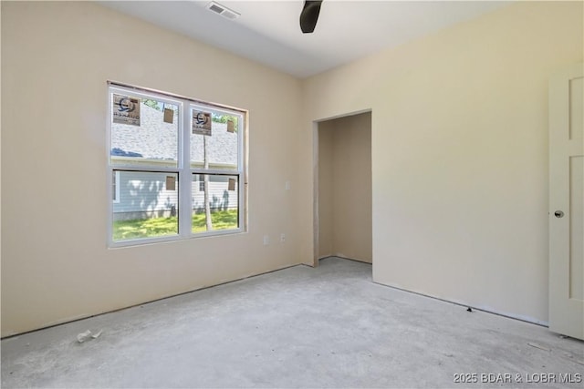 535 Grand Point Blvd, Sunrise Beach, MO 65079 - unfurnished room featuring unfinished concrete floors and a ceiling fan