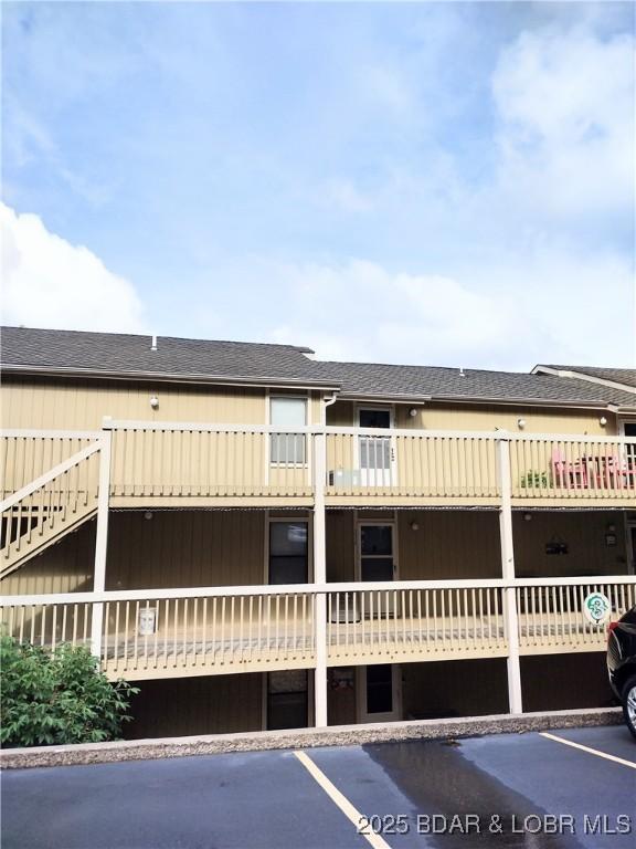 2500 Bay Point Ln Unit 342, Osage Beach, MO 65020 - view of property with uncovered parking