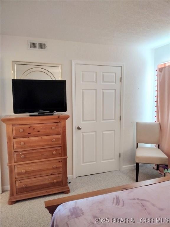 2500 Bay Point Ln Unit 342, Osage Beach, MO 65020 - carpeted bedroom featuring baseboards