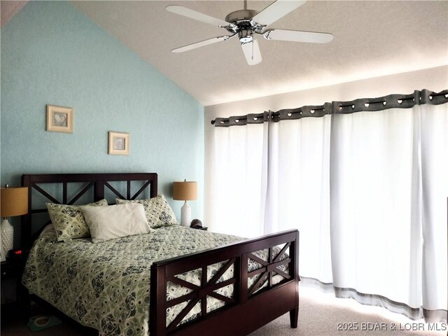 2500 Bay Point Ln Unit 342, Osage Beach, MO 65020 - carpeted bedroom featuring lofted ceiling and a ceiling fan