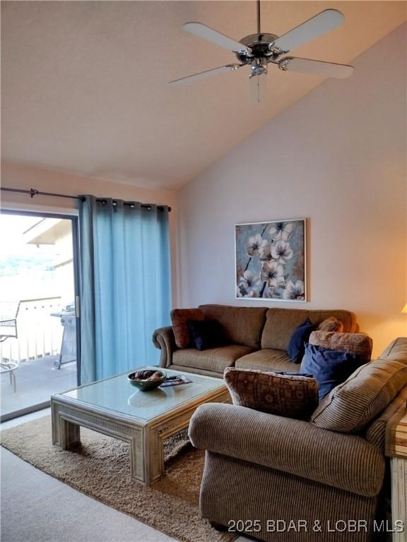 2500 Bay Point Ln Unit 342, Osage Beach, MO 65020 - living area featuring carpet floors, ceiling fan, and vaulted ceiling