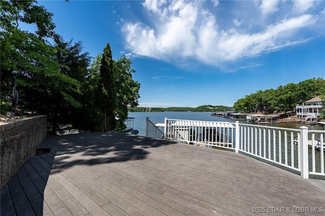 55 Nonsuch Ct, Lake Ozark, MO 65049 - wooden terrace with a water view