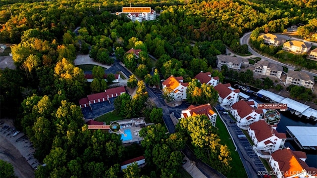 289 Charleston Dr Unit 2B, Lake Ozark, MO 65049 - aerial perspective of suburban area featuring a forest