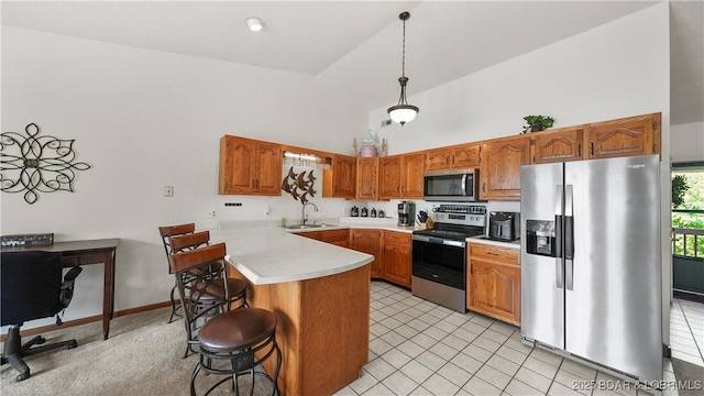 111 Rock Dove Ln Unit 3A, Camdenton, MO 65020 - kitchen featuring appliances with stainless steel finishes, high vaulted ceiling, a sink, a peninsula, and light countertops