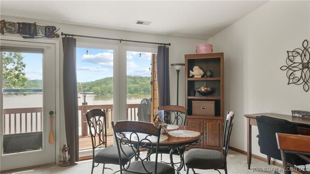 111 Rock Dove Ln Unit 3A, Camdenton, MO 65020 - dining area with a water view