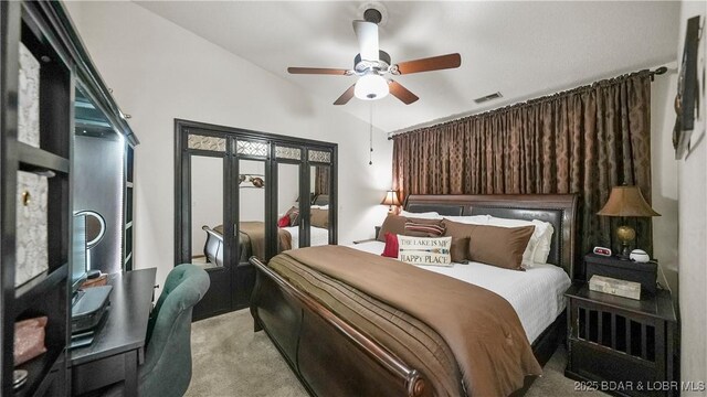 111 Rock Dove Ln Unit 3A, Camdenton, MO 65020 - bedroom featuring carpet flooring, french doors, vaulted ceiling, and ceiling fan