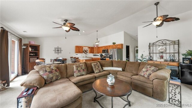 111 Rock Dove Ln Unit 3A, Camdenton, MO 65020 - living area with a ceiling fan, vaulted ceiling, and light carpet