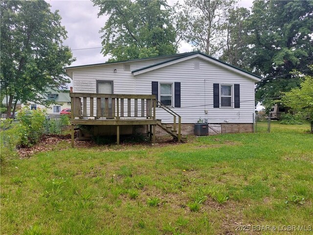 203 3rd St, Stover, MO 65078 - back of house with a deck and central AC unit